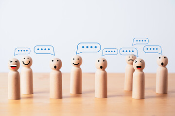 Group of wooden figure with comment message box cloud for customer feedback or group discussion for problem solving concept.