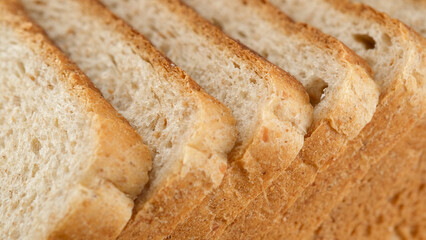 Slices of toast bread close up. Traditional bread for cooking toast