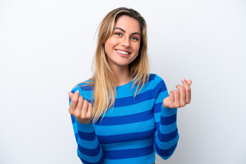 Fototapeta premium Young caucasian woman isolated on white background making money gesture