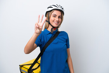 Young caucasian woman with thermal backpack isolated on white background happy and counting three with fingers