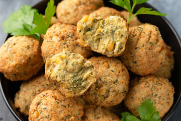 Middle Eastern vegetarian vegan chickpea and coriander falafels served with hummus