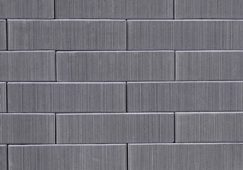 Brick wall texture seamless. Gray striped stone pattern background