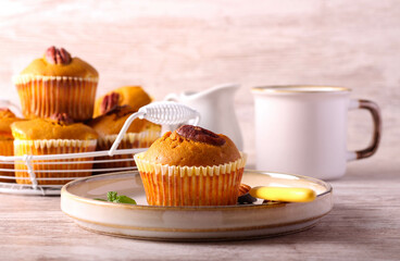 Pumpkin muffins with cream cheese filing