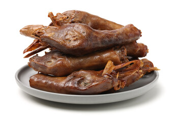 Duck head with marinated sauce on white background
