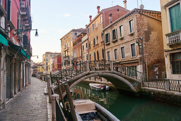 Fototapeta na wymiar Venice, Italy - October 13, 2021: Bridge over the canal in Venice. Streets of the Italian city of Venice