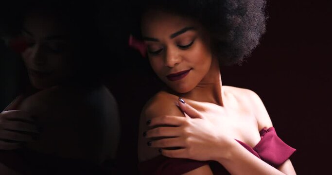 Sexy, afro and black woman with rose petals portrait mockup in studio for valentines day glamour. Sensual, passionate and flirting African girl with seductive touch for sexual desire.