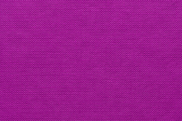 Close-up vibrant pink hardback book cover showing pattern of dimples nodules in rows 