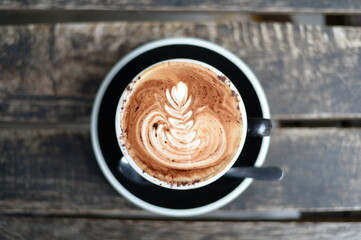A cup of cappuccino on a cold day