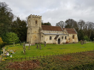 Fototapeta na wymiar Typical English church isolated in teh countryside England UK