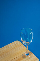 Empty glasses with a blue background, Wine glasses, Dinner and party concept.