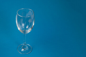 Empty glasses with a blue background, Wine glasses, Dinner and party concept.