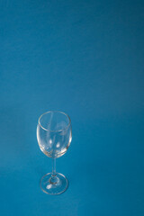 Empty glasses with a blue background, Wine glasses, Dinner and party concept.