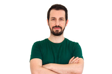 Young happy bearded man smiling with cross arms. Turkish caucasian guy is wearing green t-shirt isolated on white background.