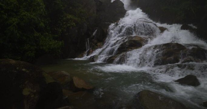krating waterfall on the mountain national park in the rainy season at chanthaburi thailand 4k video slow motion pan camera
