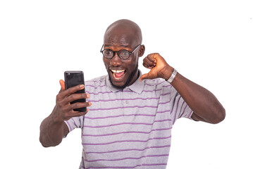 young man pointing thumb at himself using mobile phone smiling.