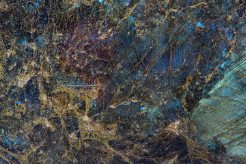 Abstract soft and blurry blue marble background with gold glitter veins