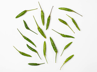Green color chilli group on White Background.