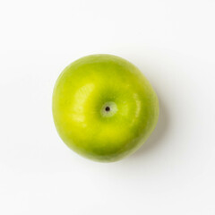 Fresh green apple on white background. Green Fruits top view.