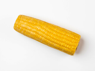Boiled Corn on the cob on white background. top view.