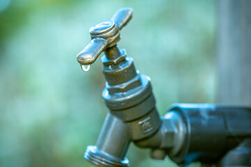 A small water tap in the garden