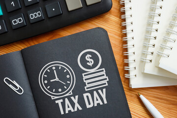 Tax day reminder on the desk, individual income tax returns