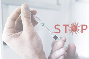 doctor holding a syringe with vaccine against flu, coronavirus, covid-19
