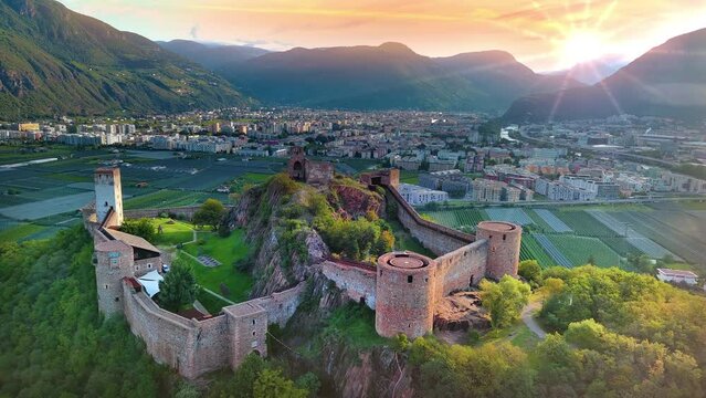 Bolzano italy skyline aerial view drone footage in 4k, bozen city europe castle viewe and old town.
