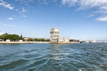 View from a tour boat over the Monument of the discoveries in Lisbon