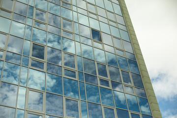 Windows in building. Mirror surface in building.