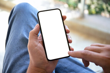 male hands holding phone with isolated screen in cafe