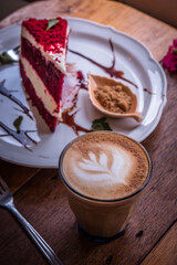 coffee cappucino cup and cake on wood table classic style in coffee shop