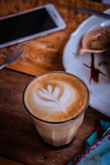 coffee cappucino cup and cake on wood table classic style in coffee shop