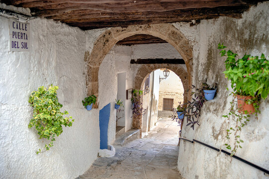 Alley of a street with several arches in the medieval and ancient town of Letur, in Albacete, Spain