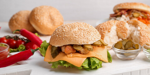 Tasty doner kebab in bun on table