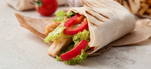 Tasty doner kebab on light background, closeup