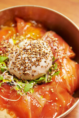 Fresh salmon donburi in a bowl