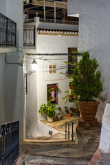 Quiet street of the town of Frigiliana, a traditional white village in the mountain of the coast of Malaga, Spain./Pueblo blanco de la costa de Malaga, Frigiliana, España