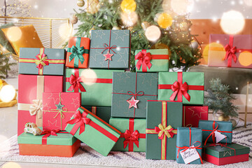 Many Christmas gift boxes in room