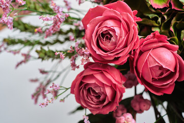 Floral abstract bouquet of peony roses on a light background. Greeting card or wallpaper. Place for text and advertising