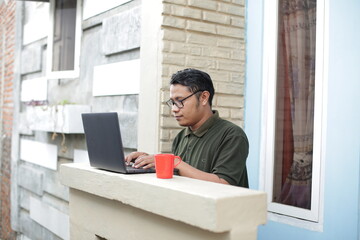 a young man with his laptop