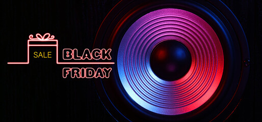 Modern loudspeaker and text BLACK FRIDAY on dark background