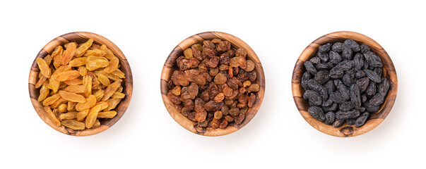 Wooden bowls with raisins as ingredient for tasty dessert