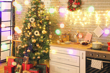 Cozy interior of modern kitchen decorated for Christmas celebration