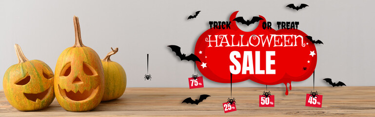 Banner for Halloween sale with carved pumpkins