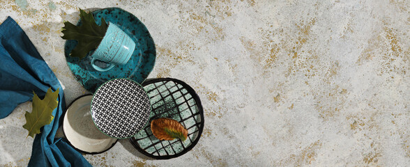 Autumn table setting on grunge background with space for text