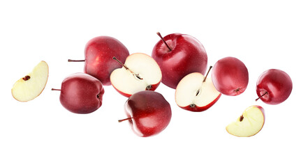 Many flying red apples isolated on white