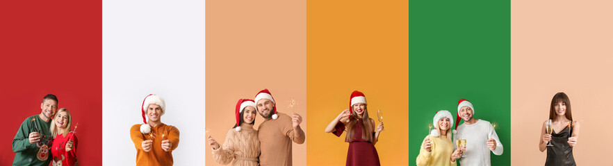 Fototapeta premium Set of people with sparklers celebrating Christmas and New Year on color background