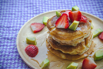 pancake strawberry avocado fruit and honey syrup sweet dessert on wood table pan cake dessert homemade