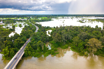 Top view Aerial photo from flying drone.Flooded rice paddies.Flooding the fields with water in...