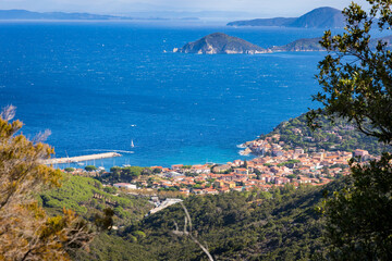 View over the houses and hills of Marciana Marina on the coast of the island of Elba